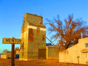grain elevator in Mentor, Kansas at sunset